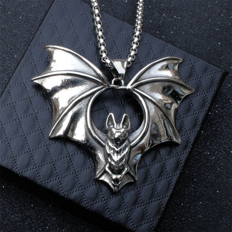 bat necklace meaning shown by a silver gothic bat pendant