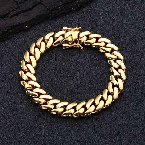 Warm gold Miami Cuban chain worn solo — the single clean piece that defines drake jewelry style