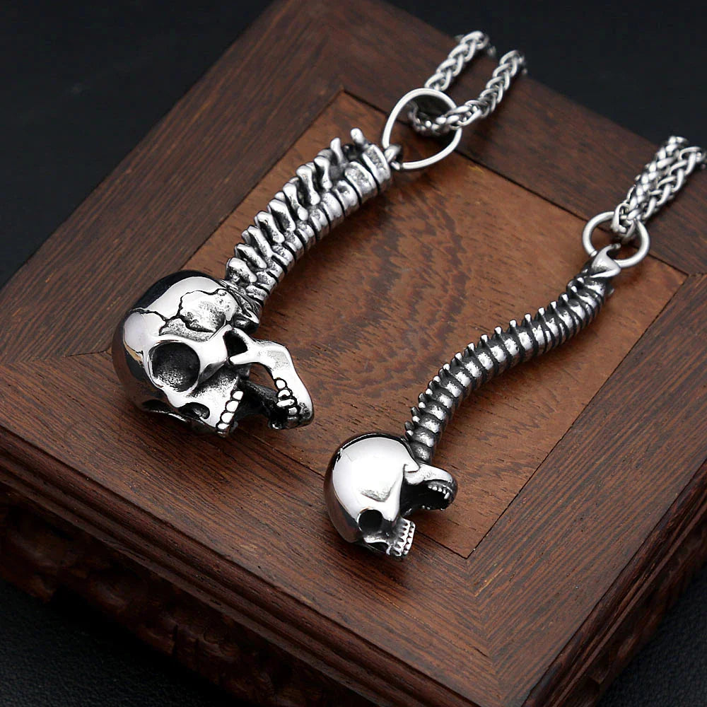 Two stainless steel skull pendants on a chain — memento mori skull jewelry for men
