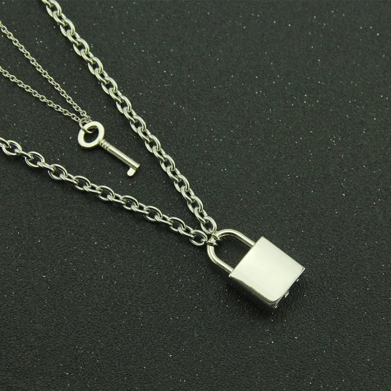key necklace meaning shown by a padlock and key pendant