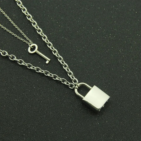 key necklace meaning shown by a padlock and key pendant
