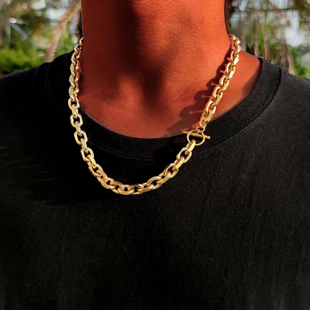 Gold stainless steel Cuban chain on a man&rsquo;s neck &mdash; DRIPLORE