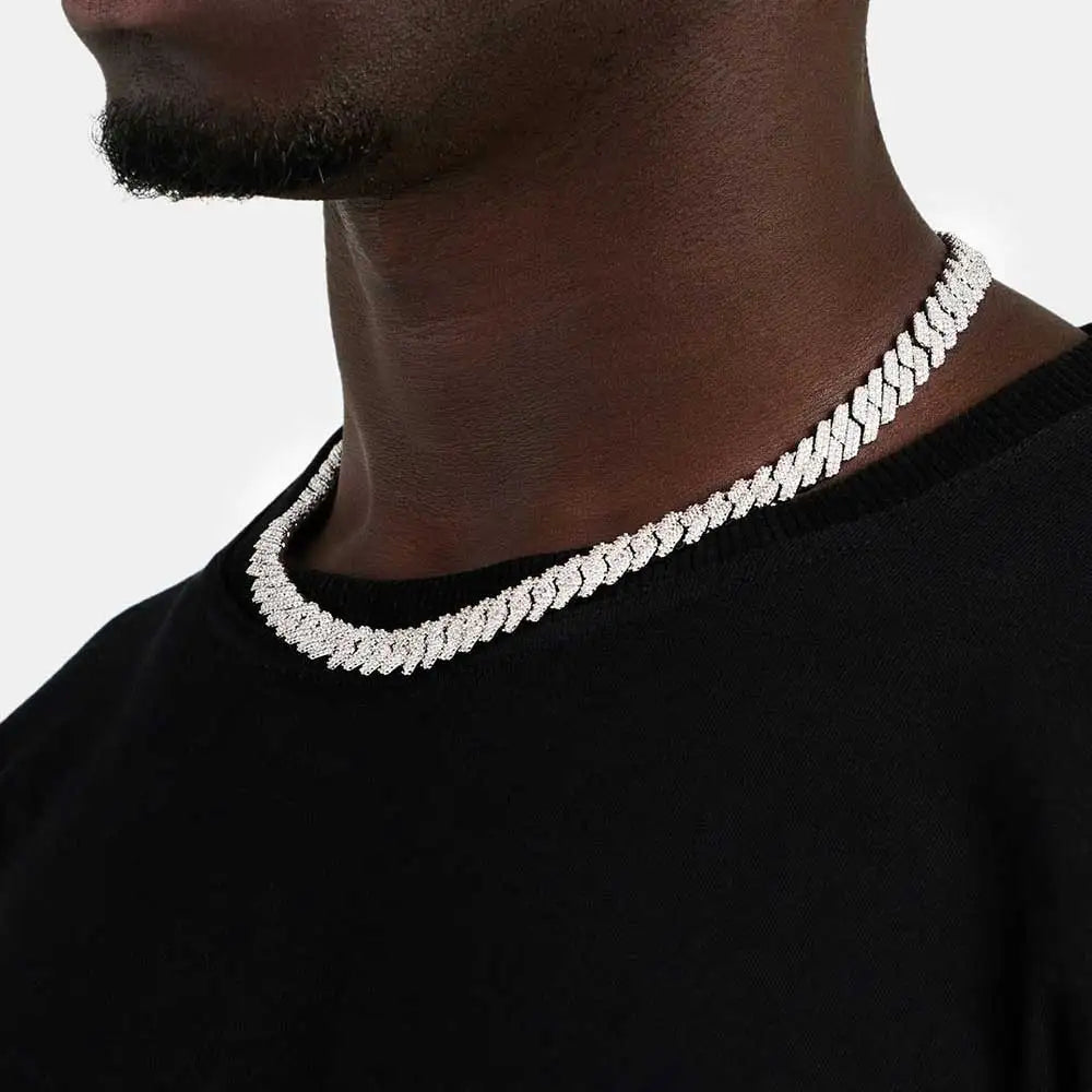 Iced out 10mm prong-set Cuban link chain on model — full pavé CZ stones every link making the chain iced out
