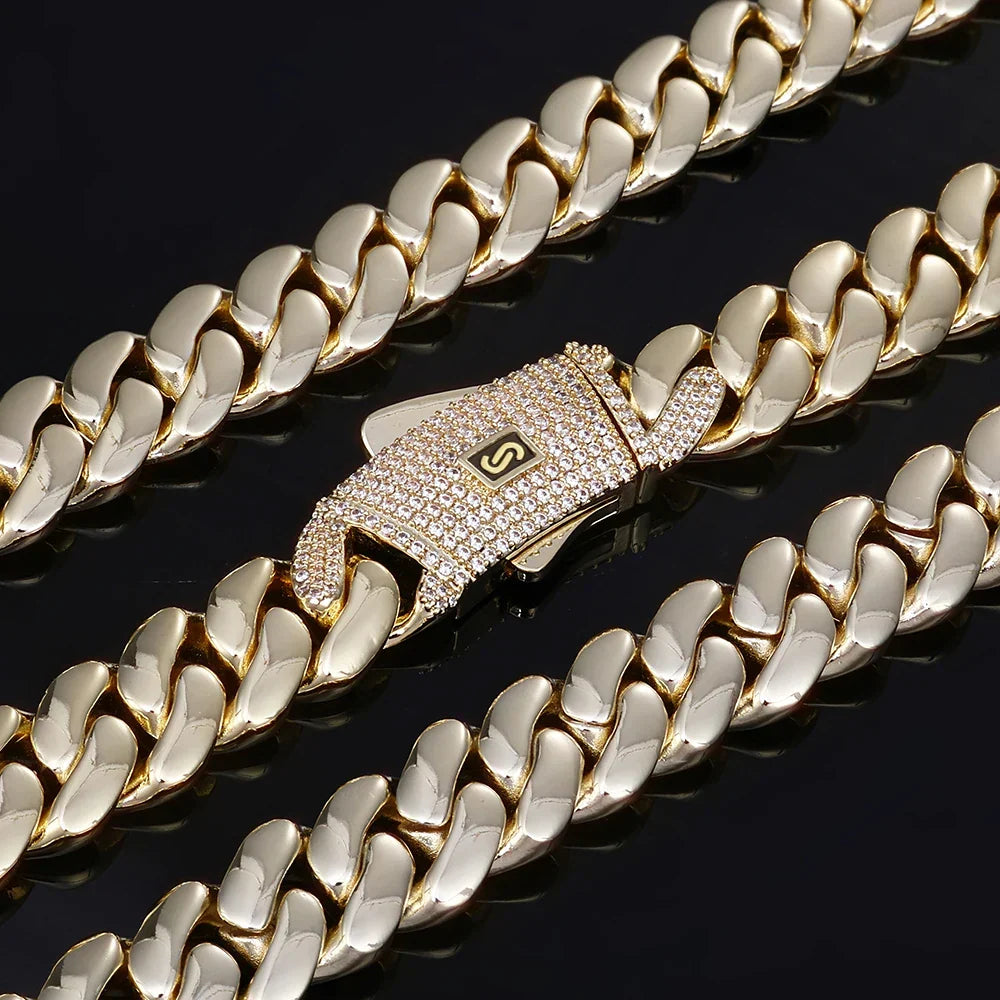 14k gold plated Cuban chain close-up with iced clasp — showing the polished gold finish and link detail