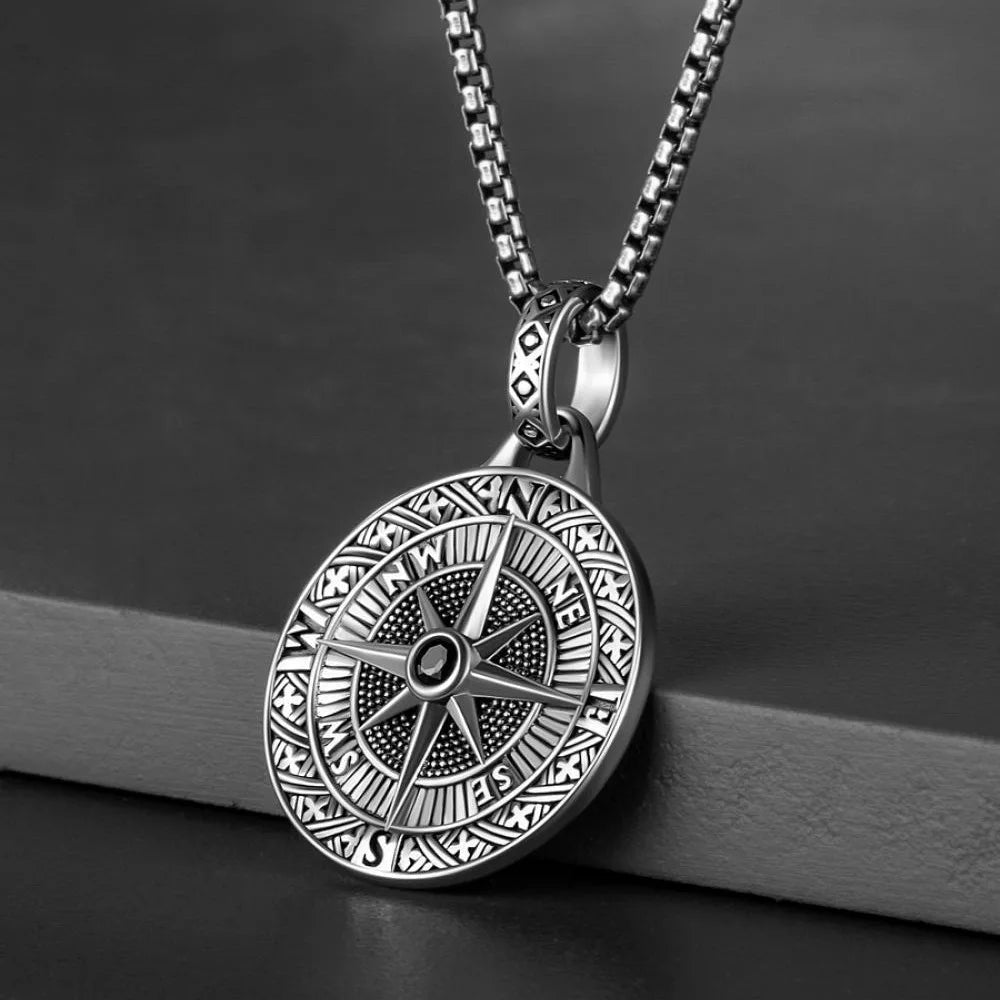 Stainless steel compass pendant on box chain — stainless steel vs sterling silver daily wear
