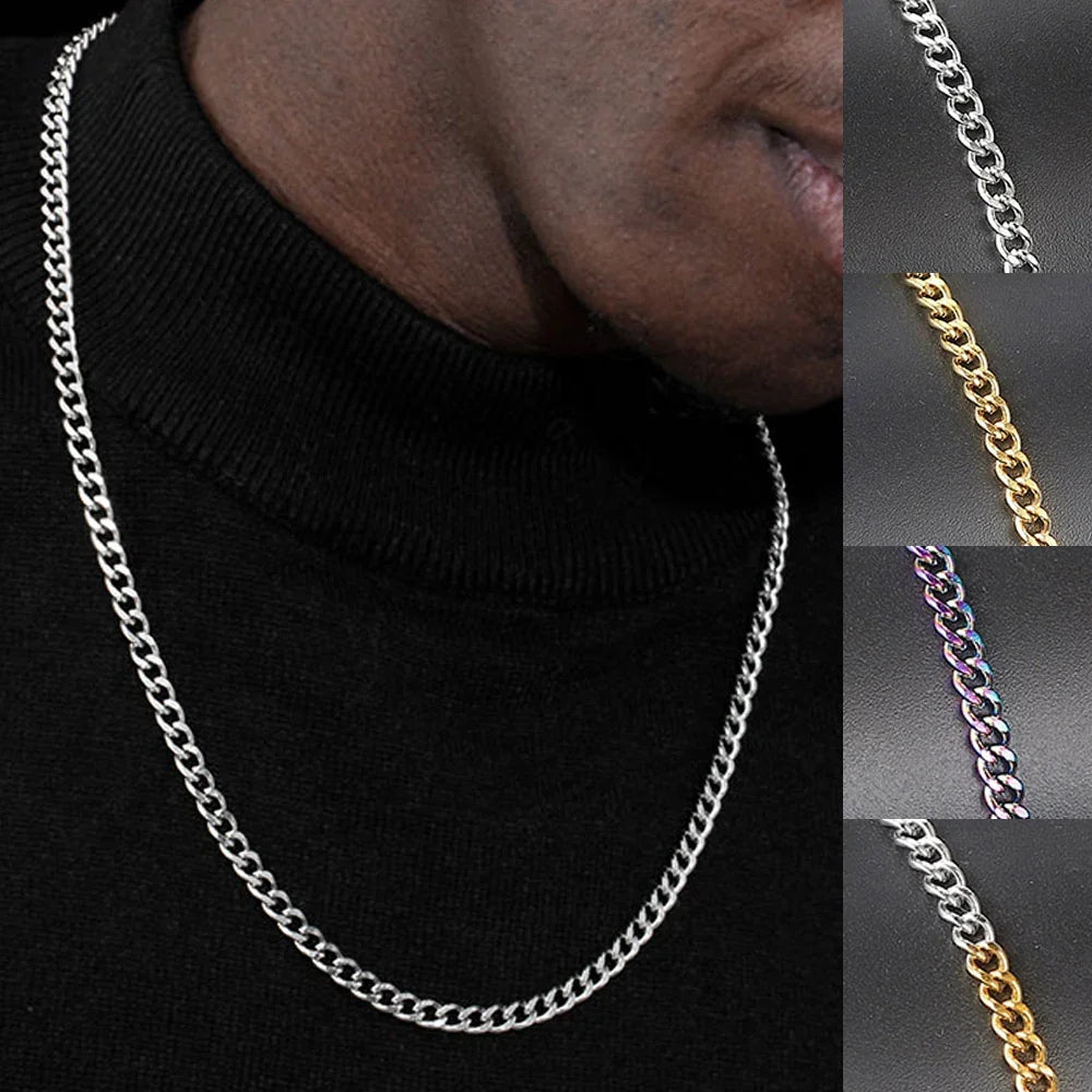 Thin 3mm stainless steel silver Cuban chain on model in black turtleneck — minimalist office-safe silver chain