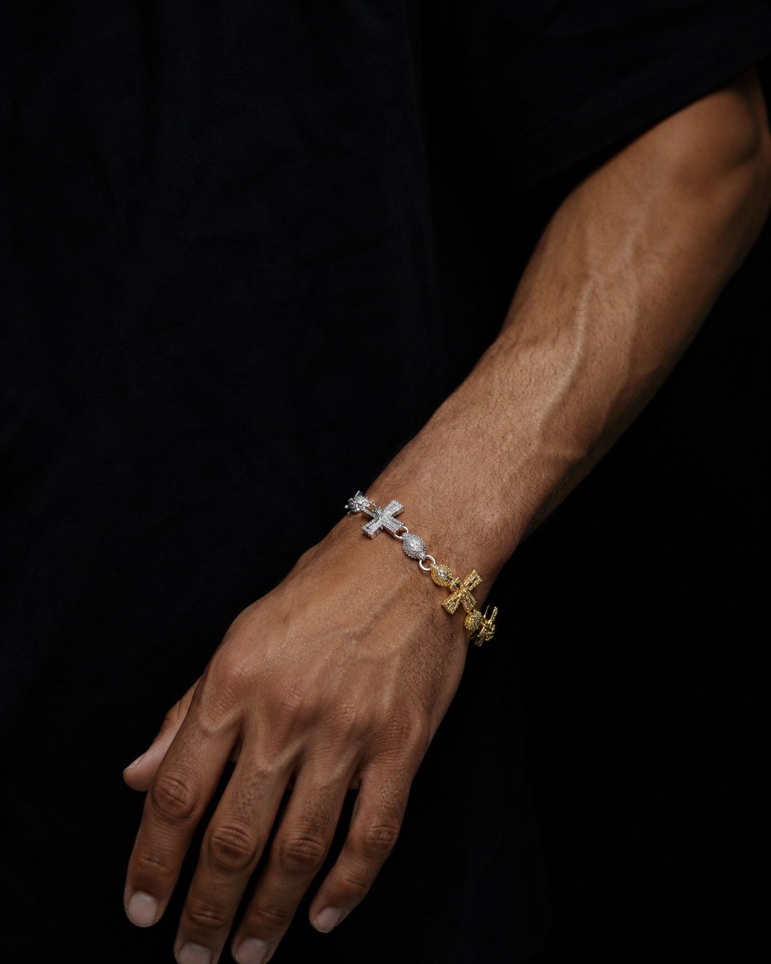 Two-tone gold and silver iced-out Cuban bracelet on a model wrist — how to pick your chain finish
