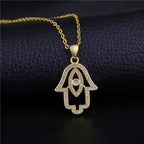 Iced Out Evil Eye Hamsa Hand of Fatima Necklace — Copper Alloy