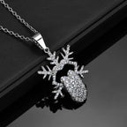 Gold Iced Out Snowflake Pendant Necklace