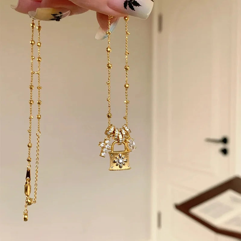 Lace Craft Running Ring Cross Pendant Lock Bag Necklace Luxury Premium Feel Collarbone Chain Niche New Sweater Chain