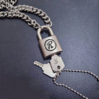 Unique design novel shape glossy and Simpli silvery keylock men pendant charms black border letter R necklace