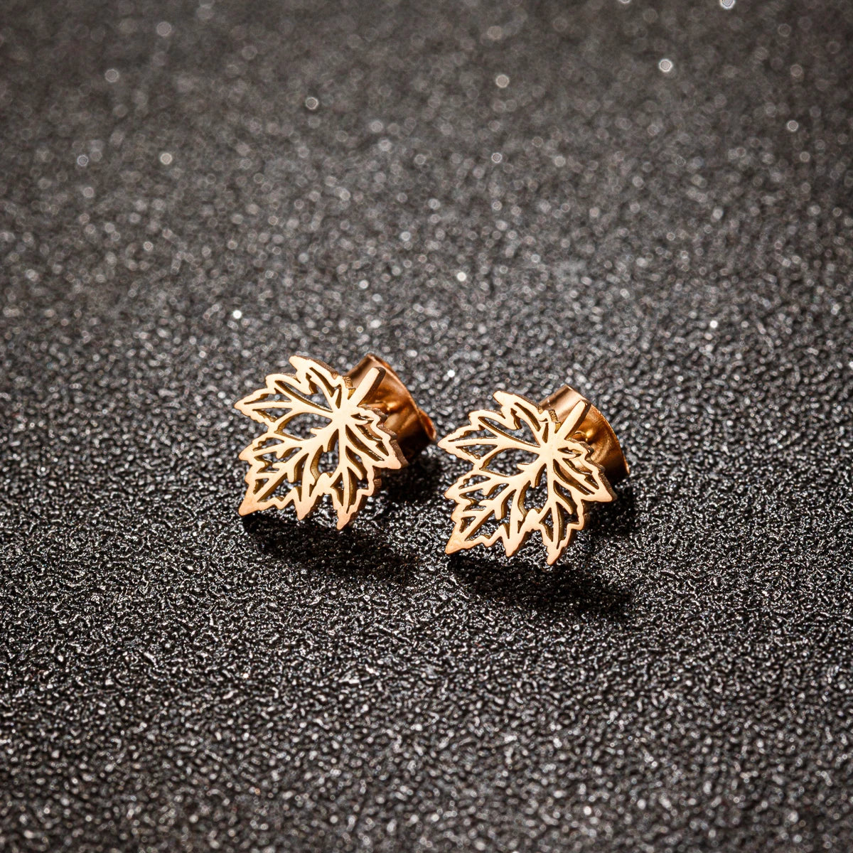 Hollow Maple Leaf Stud Earrings Classic Simple — Stainless Steel