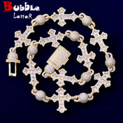 Iced Out Ball Infinity Cross Pendant — Gold-Tone CZ