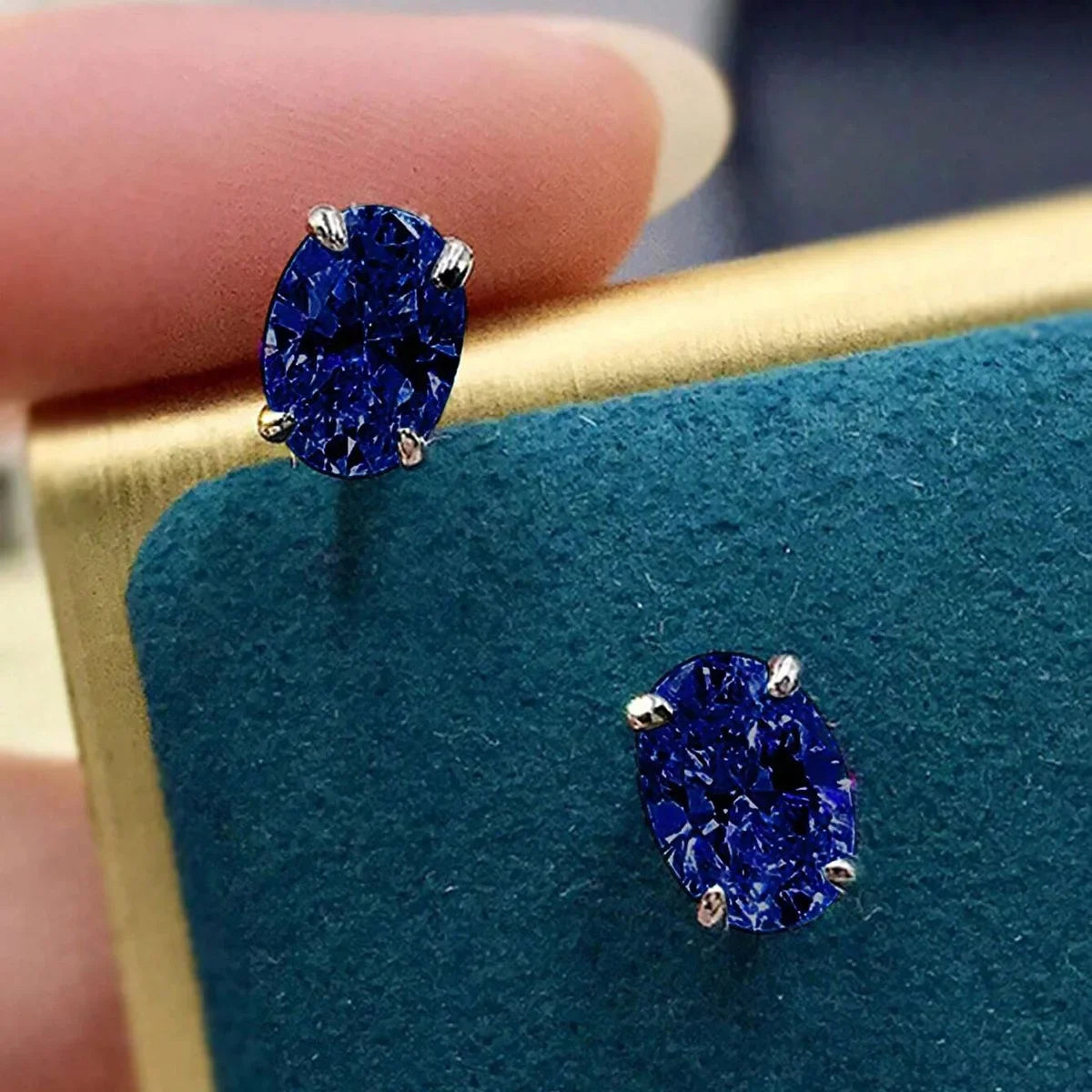 Oval Colored Zircon Four Claw Stud Earrings — Stainless Steel