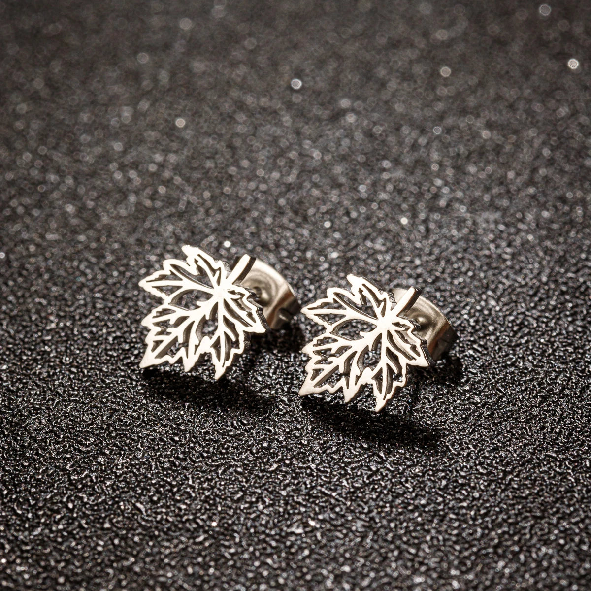 Hollow Maple Leaf Stud Earrings Classic Simple — Stainless Steel