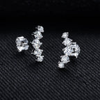 Iced Out Stud Earrings — 925 Silver