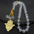 Hamsa Hand Evil Eye Lotus Pendant Necklace — Gold-Tone Steel