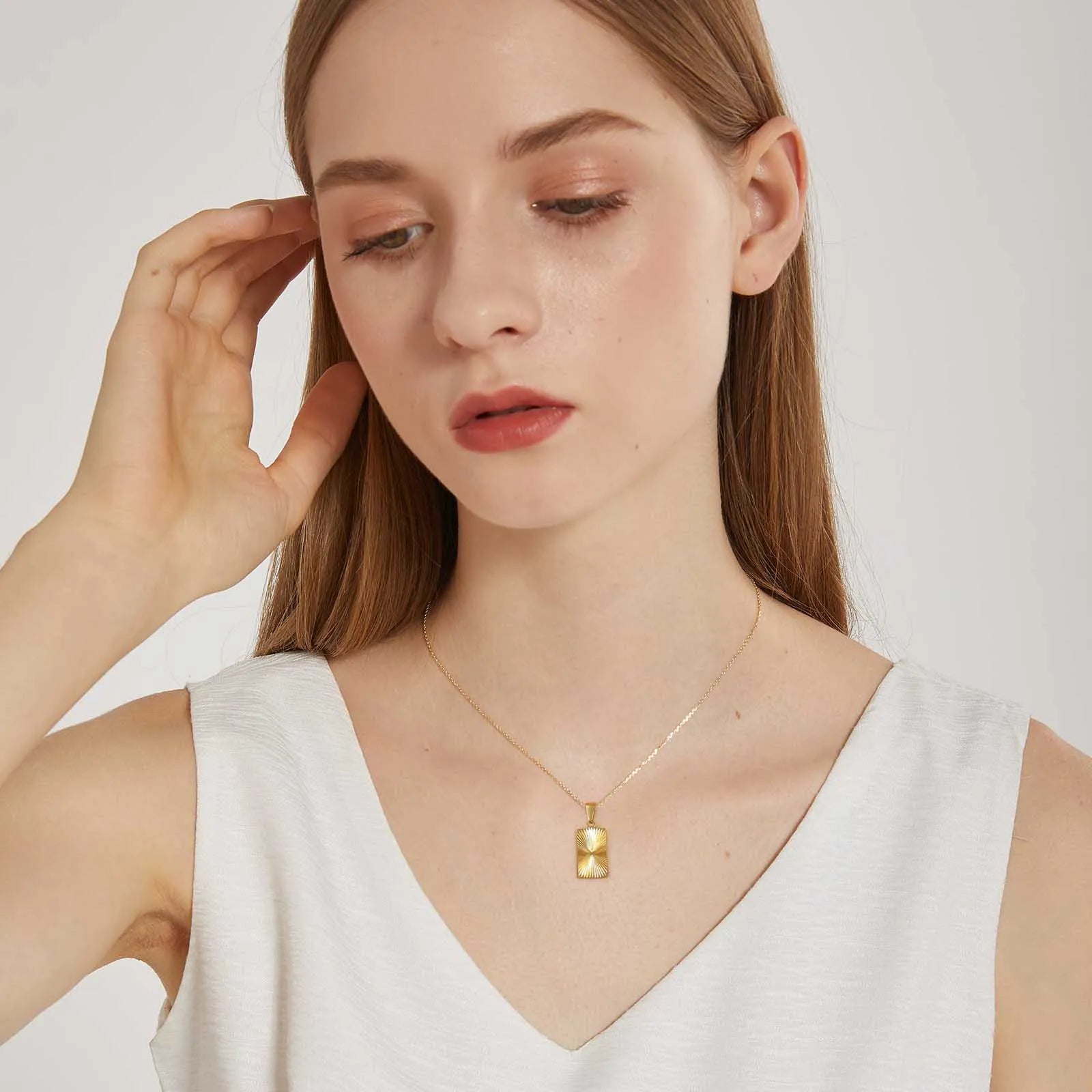 Sunburst Rectangle Pendant — Gold Stainless