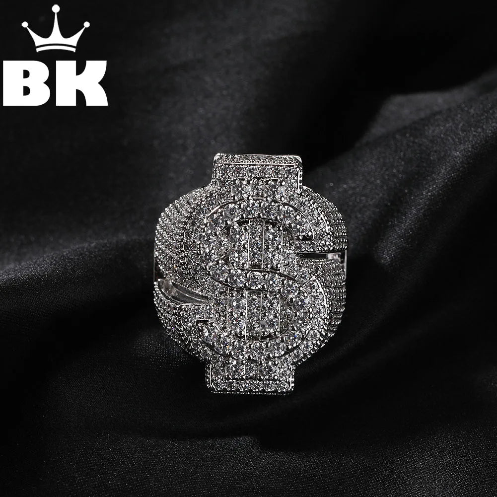 THE BLING KING Icy Dollar Sign Ring For Men Full Micro Paved 5A+ Cubic Zirconia Money Charm Punk Rock Finger Accessories Rapper