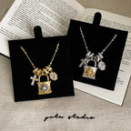 Lace Craft Running Ring Cross Pendant Lock Bag Necklace Luxury Premium Feel Collarbone Chain Niche New Sweater Chain