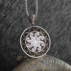 Sun Hugging Moon Round Pendant — Stainless Steel