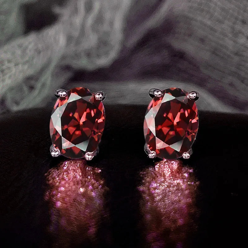 Oval Colored Zircon Four Claw Stud Earrings — Stainless Steel