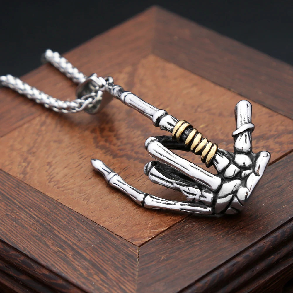 Skull Rock Hand Pendant — Stainless Steel