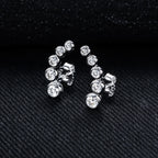 Iced Out Stud Earrings — 925 Silver