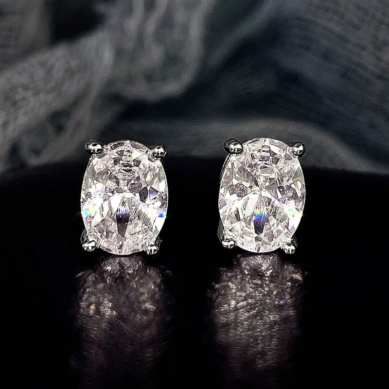Oval Colored Zircon Four Claw Stud Earrings — Stainless Steel