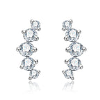 Iced Out Stud Earrings — 925 Silver