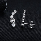 Iced Out Stud Earrings — 925 Silver