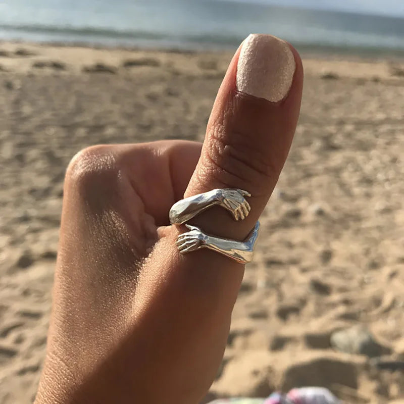 Hug Hands Open Adjustable Ring — Gold-Tone, Clear Stones