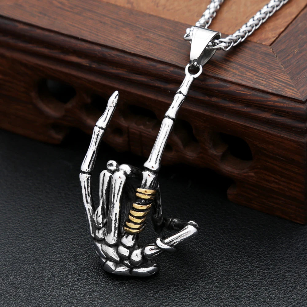 Skull Rock Hand Pendant — Stainless Steel