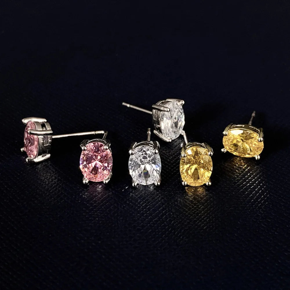 Oval Colored Zircon Four Claw Stud Earrings — Stainless Steel