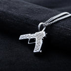 Iced Out Gun Pendant — 925 Silver
