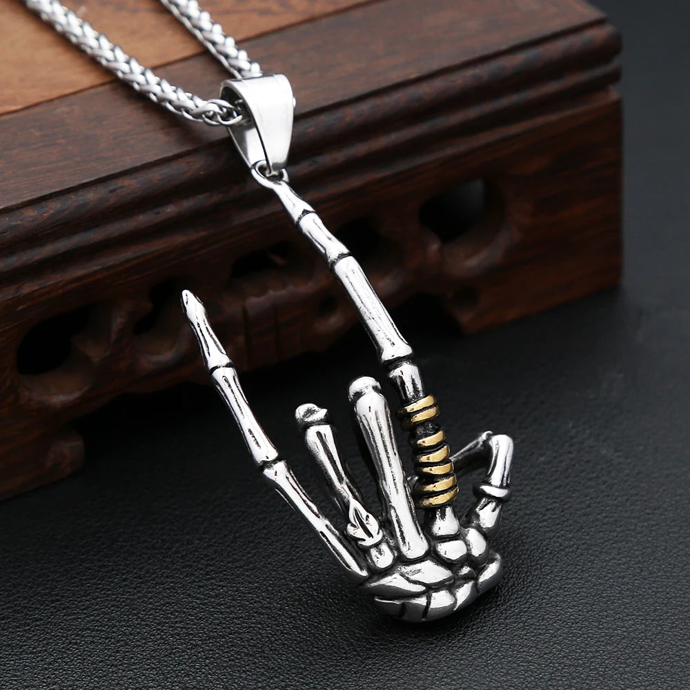 Skull Rock Hand Pendant — Stainless Steel