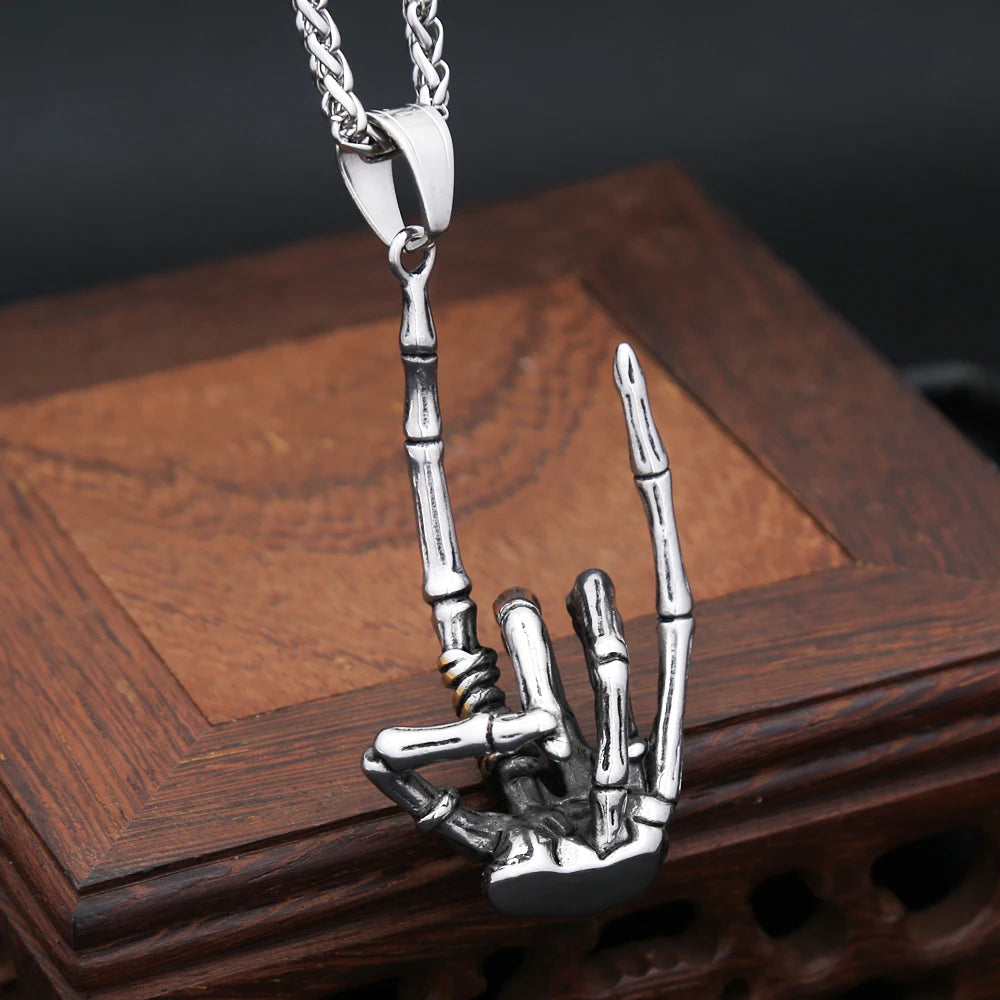 Skull Rock Hand Pendant — Stainless Steel