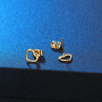 Love Heart Hollow Stud Earrings — Stainless