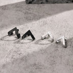 Triangle Stud Earrings — Stainless Steel