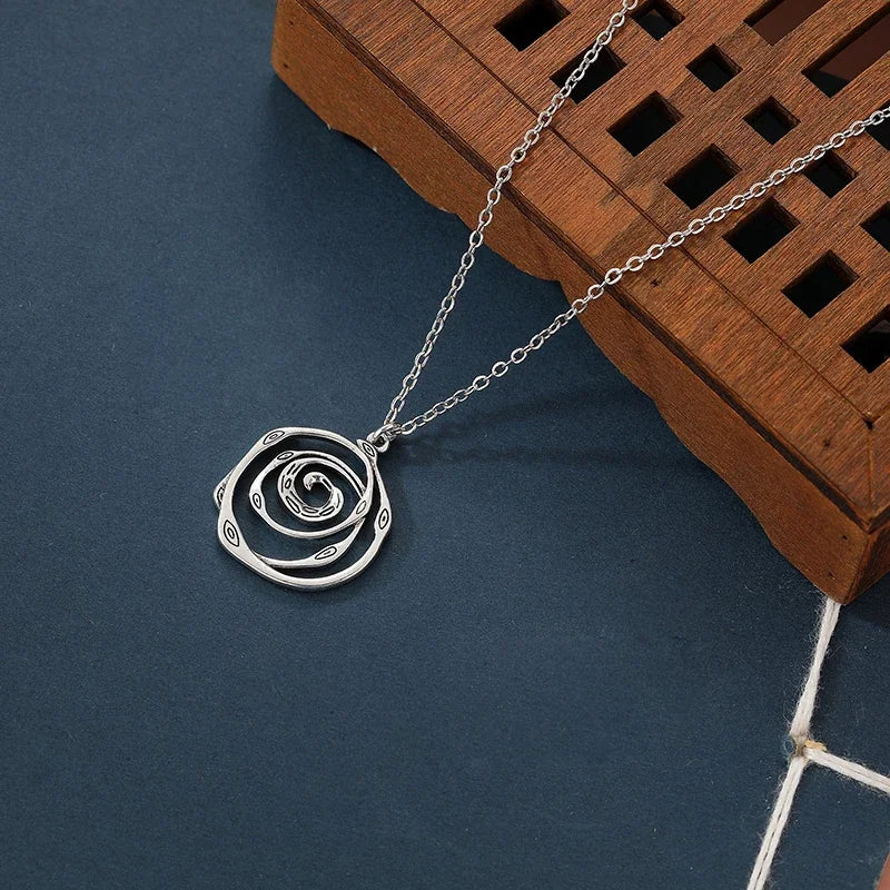 Snake Vortex Pendant Necklace — Copper