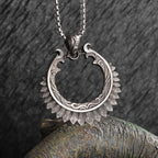 Sun Hugging Moon Round Pendant — Stainless Steel