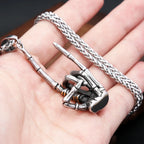 Skull Rock Hand Pendant — Stainless Steel